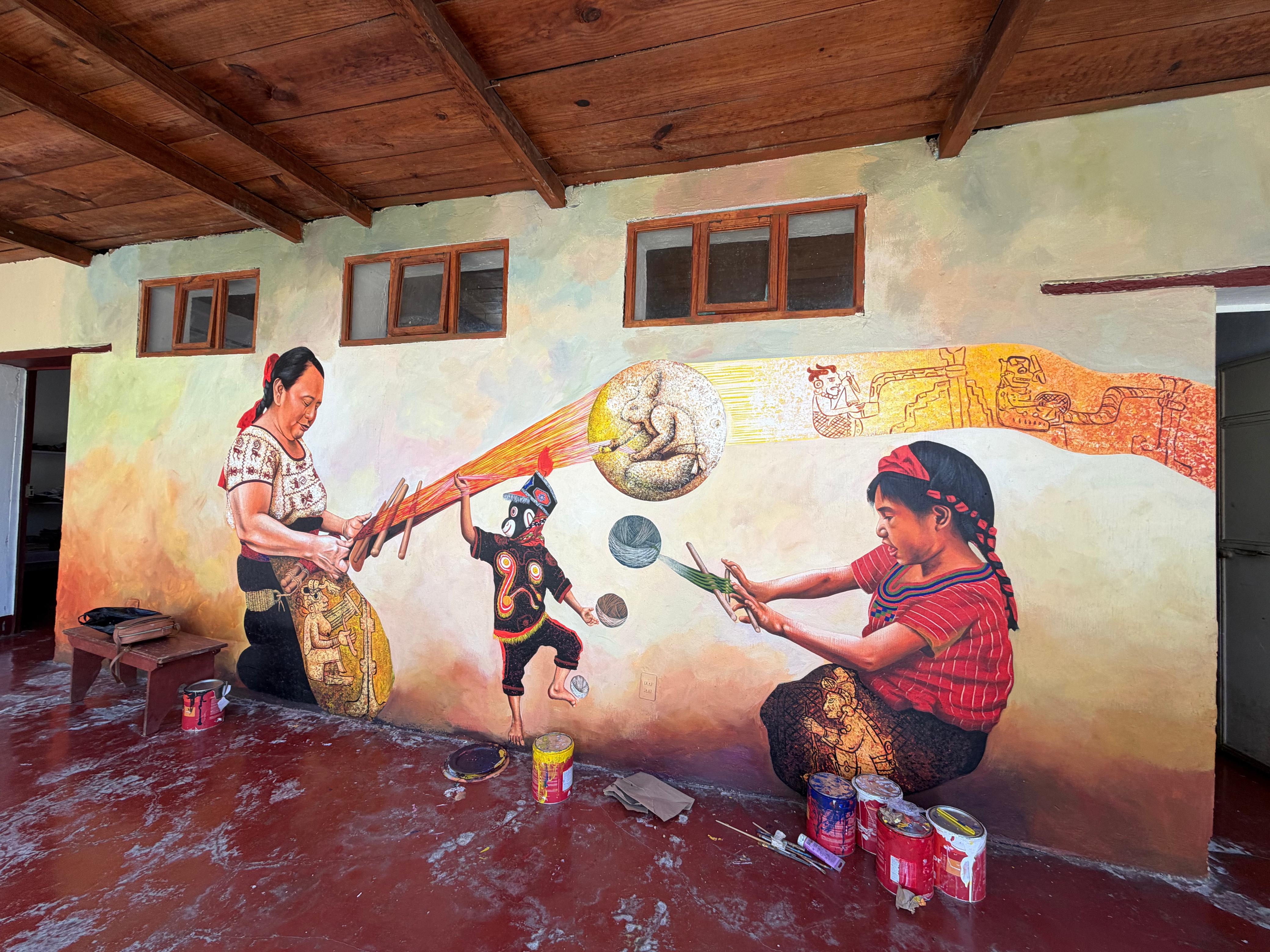 Mural de artesanas tejiendo
